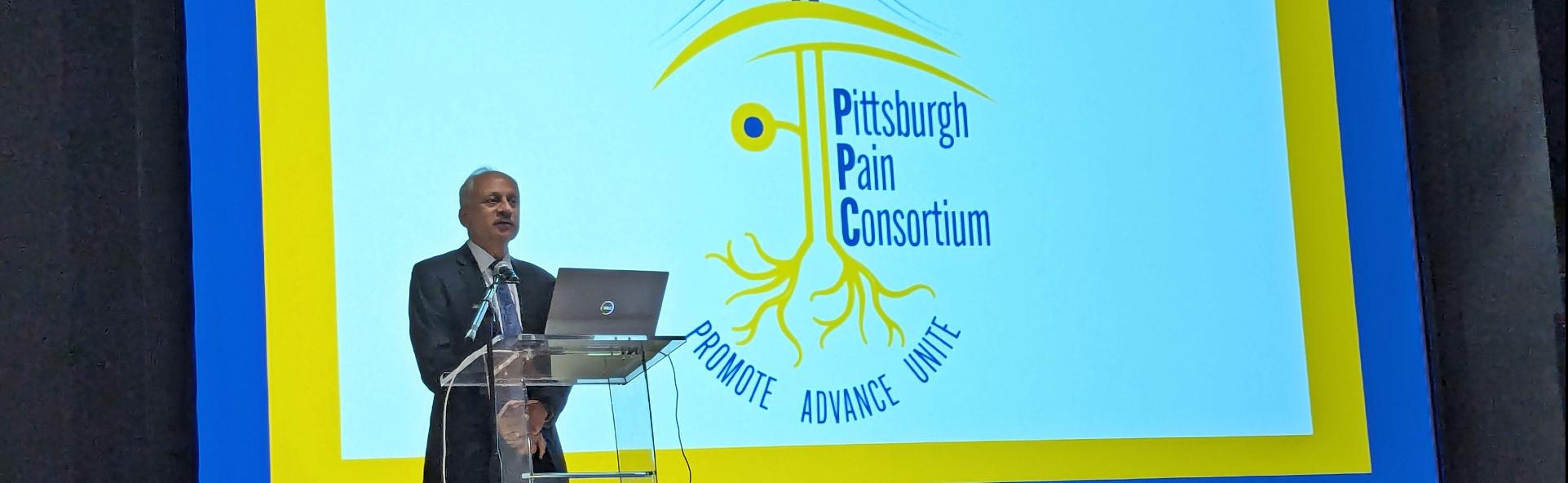 Dean Shekhar speaking at Pain Day 2025